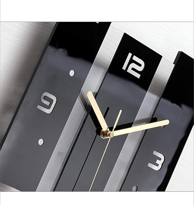 Modern Black Acrylic Pendulum Wall Clock - close up of gold hands and clock face