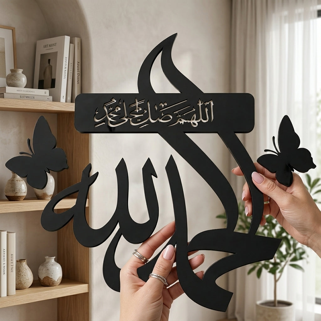 Person holding Alhamdulillah Black Acrylic Wall Art with butterfly accents