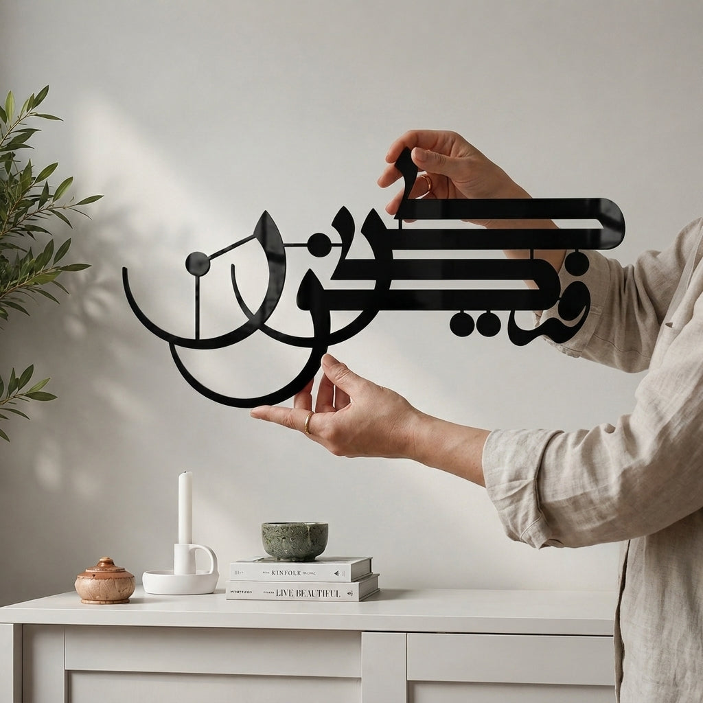 Person holding Kun FaYa Kun Black Acrylic Wall Art
